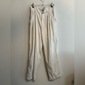 #830 Urban Outfitters Cream pleated ankle trousers